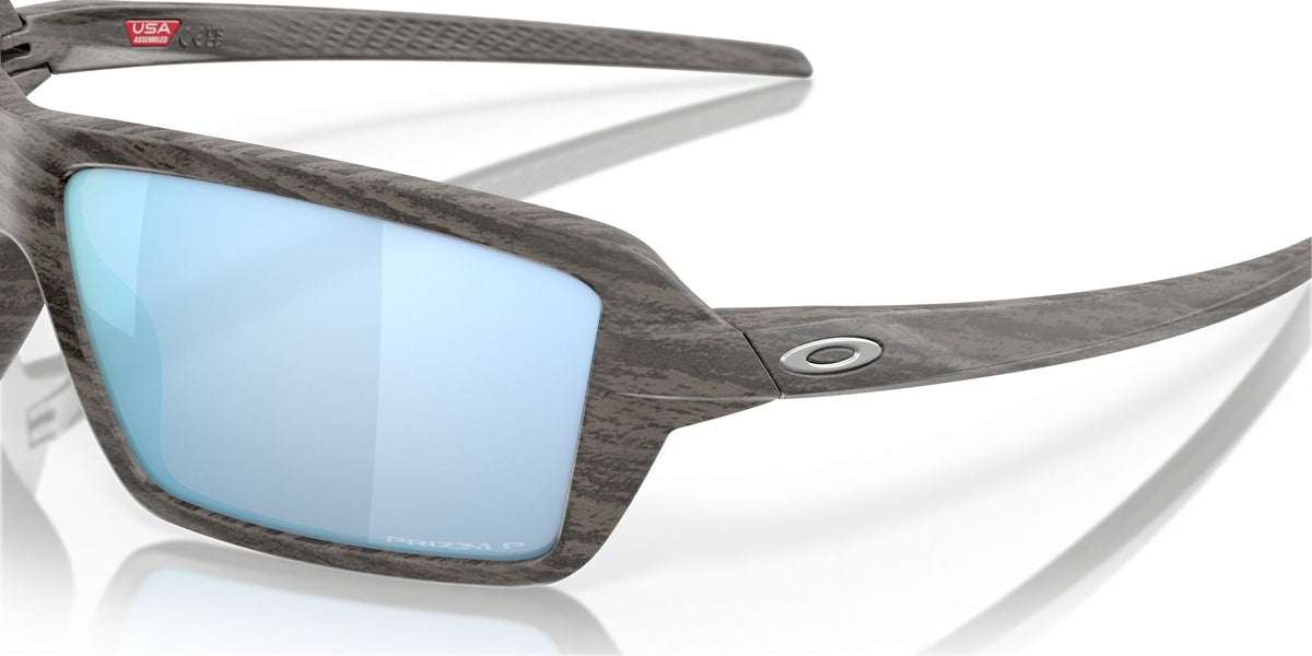 Oakley Cables 0OO9129 912906 63 Woodgrain / Prizm Deep Water Polarized 63 / Plastic / Plastic