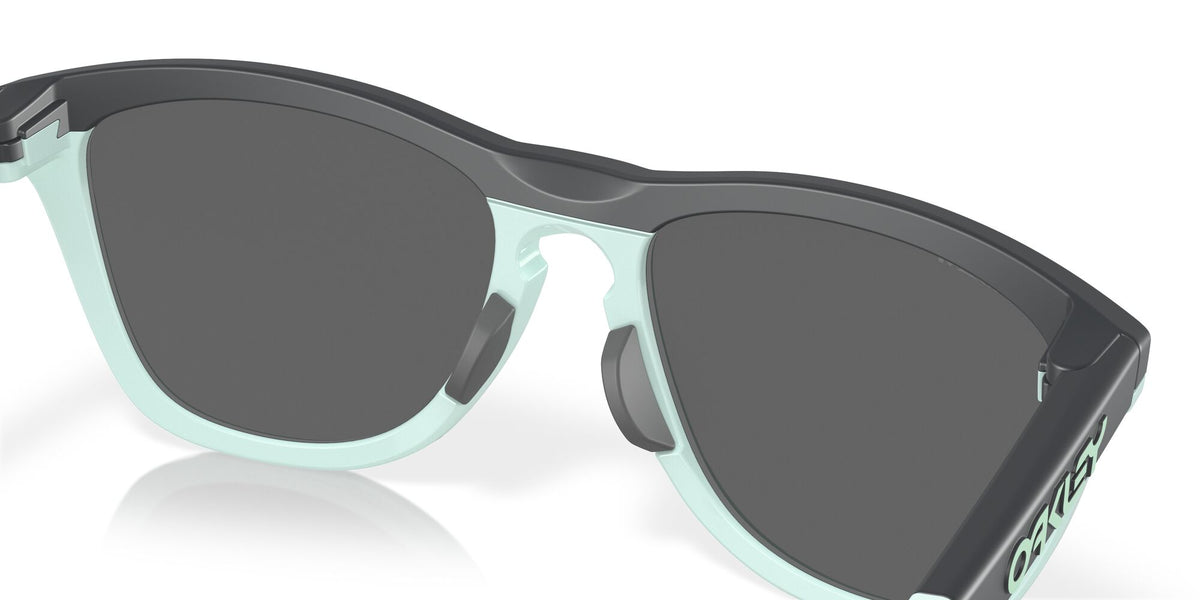 Oakley Frogskins Range 0OO9284 928403 55 Matte Carbon/Blue Milkshake / Prizm Black 55 / Polycarbonate / O_matter / Injected