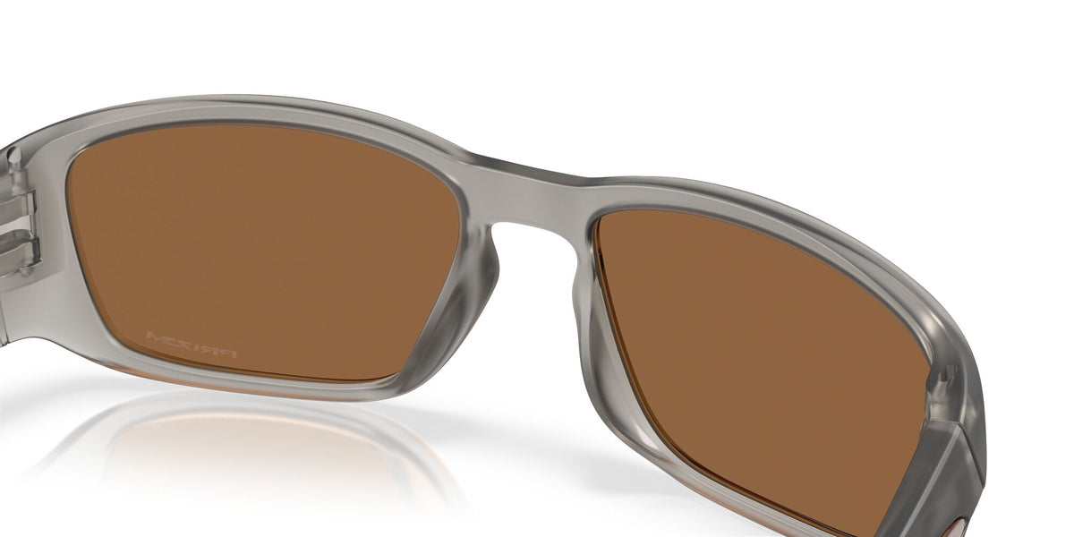 Oakley Tourniquet 0OO9521 952102 57 Grey/ Prizm Bronze