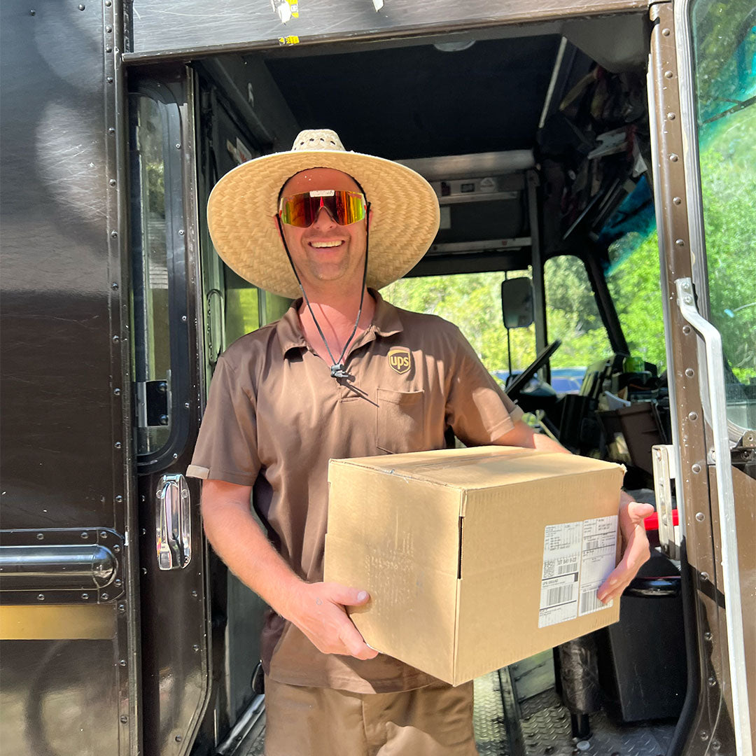 lifestyle - mail man wearing heater flip offs